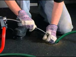 Todd, one of our Berkley plumbing pros is using a Ridgid drain sneak to clear a clogged drain